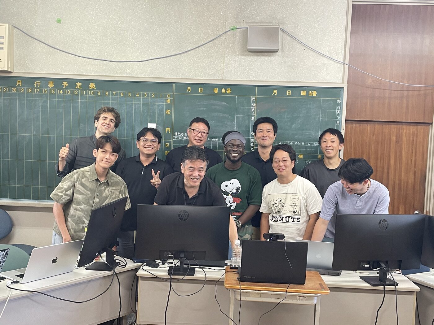 Participants smiling together in the classroom